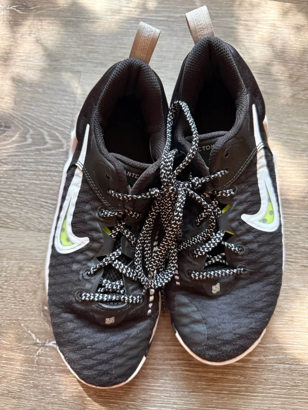 Nike Black and White Running Shoes with Lime Swoosh Accents